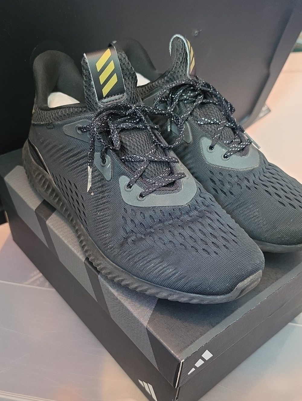 adidas Men’s Black AlphaBounce Athletic Sneakers with Yellow Heel Tab